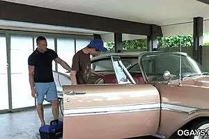 Young and old gay couple having fun together